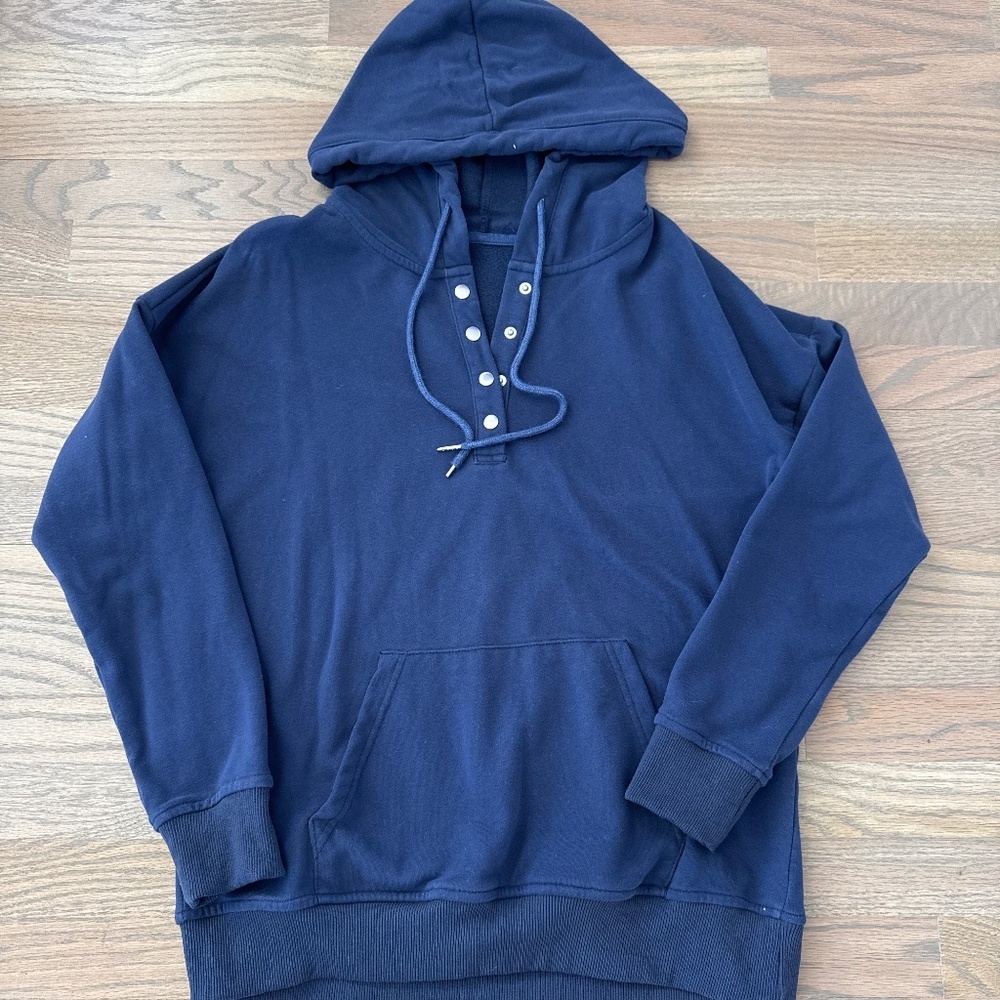 Navy Blue sweatshirt w/snap button neck and hood. Size M